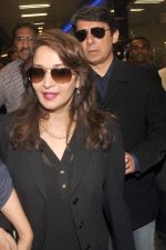 Madhuri dixit snapped with husband in Mumbai Airport on 6th April 2012 (26).jpg